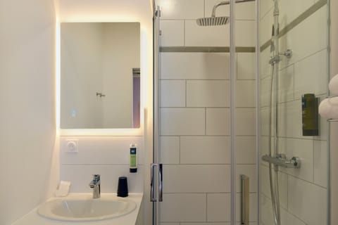 Eco-friendly toiletries, hair dryer, towels, soap