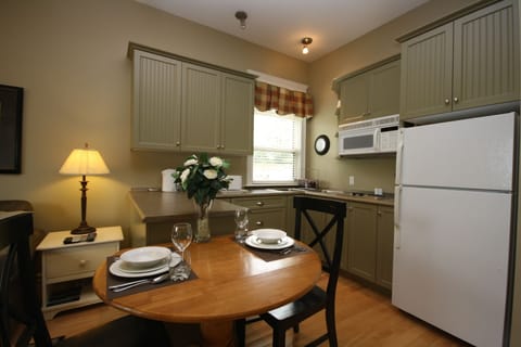 Furnished Apartment (102) | Private kitchen | Full-size fridge, microwave, stovetop, dishwasher