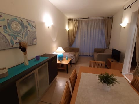 Family Apartment, 3 Bedrooms, Sea View, Beachside | Living area | Flat-screen TV