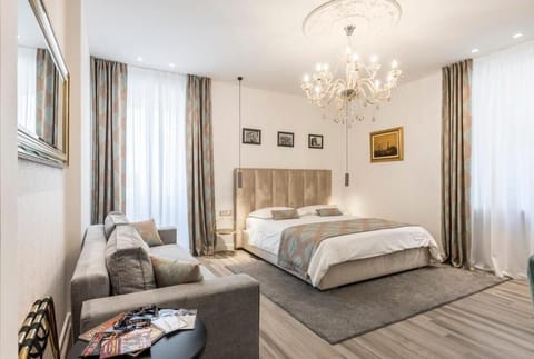 Superior Double Room, Courtyard View (Ana) | Minibar, in-room safe, desk, laptop workspace