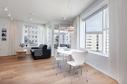 Premier Apartment, 1 Bedroom, Balcony, City View | Living area | Flat-screen TV, heated floors