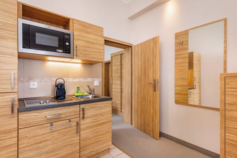 Apartment, Balcony, Sea View | Living area | Flat-screen TV