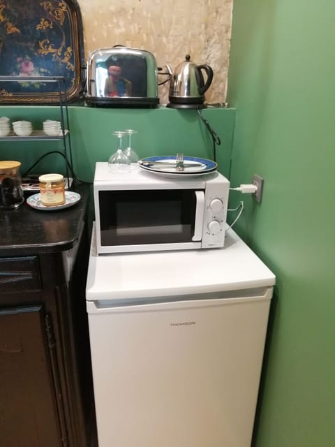 Shared fridge, microwave, coffee/tea maker, electric kettle