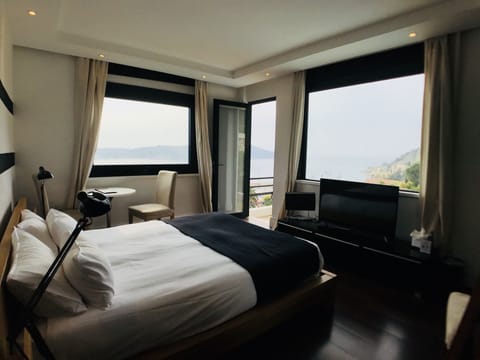 Family Suite, Connecting Rooms, Sea View | In-room safe, desk, free WiFi