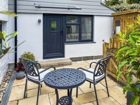 View from the courtyard area of The Nest. A lovely area that catches the evening sunshine. The perfect place to sit and enjoy the sunset after a busy day! | The Nest, Lelant Downs, near St Ives