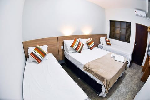 Family Quadruple Room, Multiple Beds | Minibar, desk, free WiFi, bed sheets