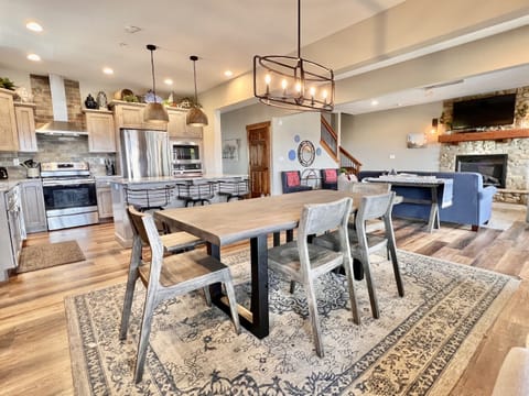 Solid dining table with extra seating