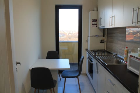 Apartment, Balcony | Private kitchen | Full-size fridge, microwave, stovetop, espresso maker