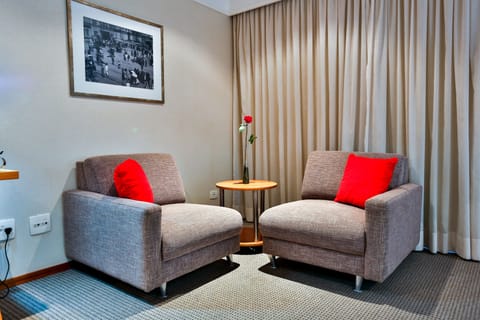 Deluxe Suite, 1 King Bed | Living area | LCD TV