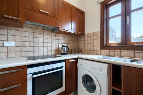 Apartment | Private kitchen | Full-size fridge, microwave, oven, stovetop