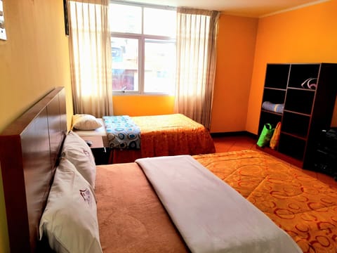 Family Room, 1 Bedroom | Down comforters, desk, free WiFi, bed sheets