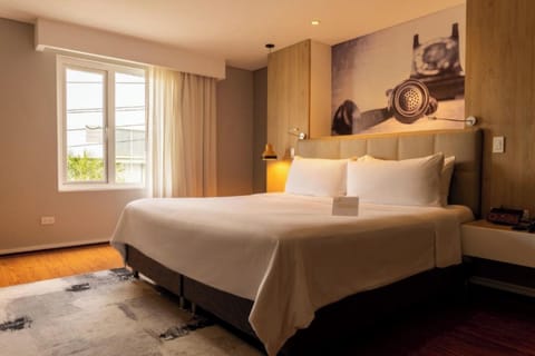 Junior Suite, 1 King Bed | Premium bedding, down comforters, minibar, in-room safe