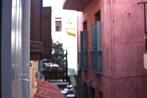 View to the alley from the 1st and 2nd floor and windows.