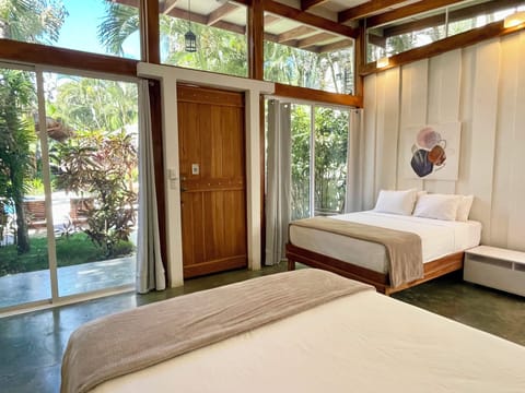 Quadruple Room, Pool View | Premium bedding, in-room safe, free WiFi, bed sheets