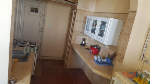 Full-size fridge, microwave, oven, cookware/dishes/utensils