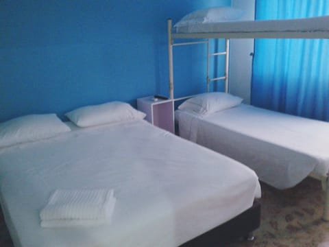 Quadruple Room, Non Smoking | Iron/ironing board, free WiFi, bed sheets