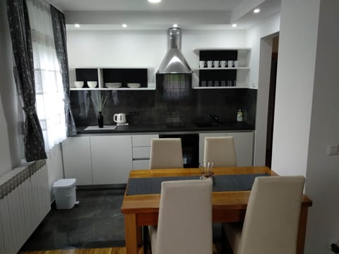 Family Apartment, Multiple Beds, Garden View | Private kitchen | Electric kettle