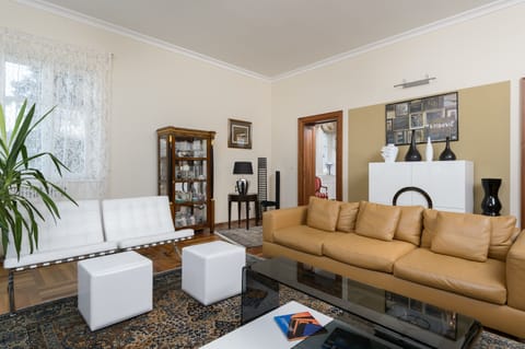 Deluxe Villa | Living room | Flat-screen TV, video-game console, DVD player, iPod dock