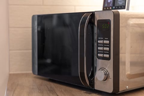 Fridge, microwave, electric kettle, cookware/dishes/utensils