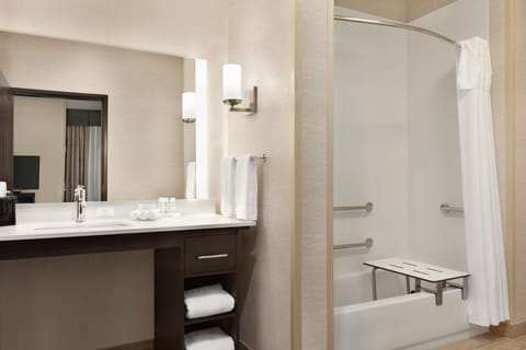 Suite, 1 King Bed, Accessible, Bathtub | Bathroom | Hydromassage showerhead, towels
