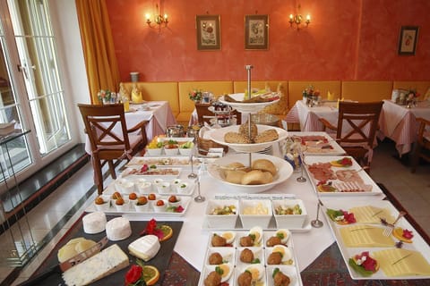 Daily buffet breakfast (EUR 15 per person)