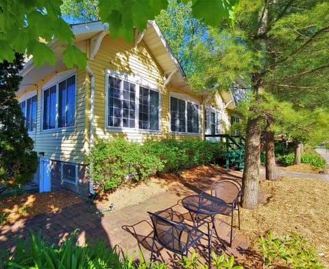 Front of house. Bistro table out front for morning coffee.
