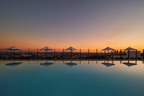 Outdoor pool, cabanas (surcharge), pool umbrellas