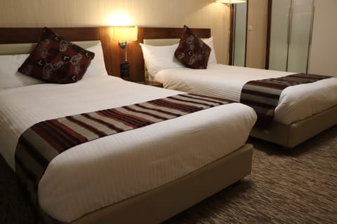 Standard Twin Room, Multiple Beds, Garden View | Premium bedding, down comforters, pillowtop beds, in-room safe