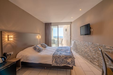 Standard Double Room, Balcony, Sea View | In-room safe, individually decorated, individually furnished, desk