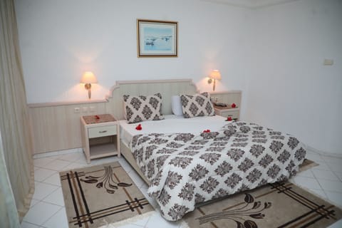 Double or Twin Room | Desk, blackout drapes, free WiFi, bed sheets