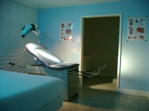 Adults Only Room (Doctor Office Themed) | Individually decorated, blackout drapes, iron/ironing board, free WiFi