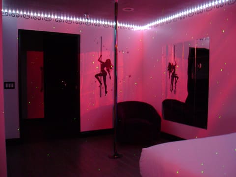 Adults Only Room (Pole Dancer Themed) | Individually decorated, blackout drapes, iron/ironing board, free WiFi