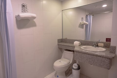 Combined shower/tub, deep soaking tub, free toiletries, hair dryer