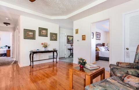 The Great Room with entrance foyer at mid back, shows the separation of bedrooms