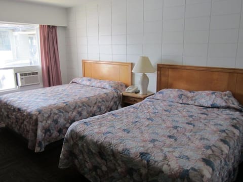 Room (Queen Room with Two Queen Beds) | Iron/ironing board, free WiFi, bed sheets