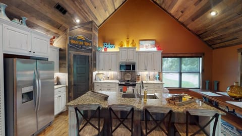 Kitchen area that adjoins with living room