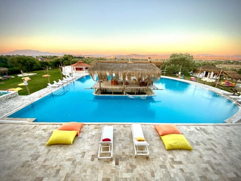 Seasonal outdoor pool, pool umbrellas, sun loungers