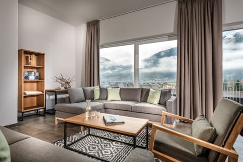 Apartment, Terrace, Mountain View (Alpine Royal) | Living area | LCD TV, fireplace