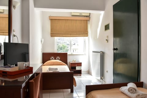 Economy Room | Blackout drapes, free WiFi