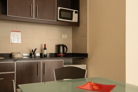 Classic Suite, 1 King Bed | Private kitchenette | Mini-fridge, microwave, coffee/tea maker, electric kettle