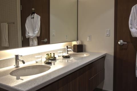 Suite, 1 Bedroom | Bathroom | Shower, free toiletries, hair dryer, bathrobes
