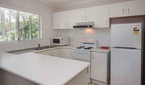 Apartment, 2 Bedrooms | Private kitchen | Full-size fridge, microwave, oven, electric kettle