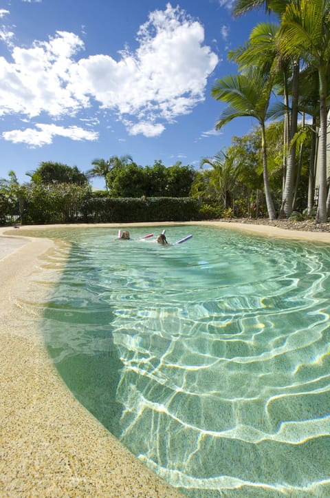 Outdoor pool, pool umbrellas, sun loungers