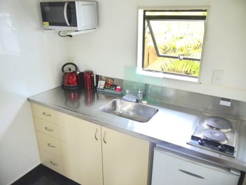 Family Cottage, 2 Bedrooms | Private kitchen | Fridge, microwave, coffee/tea maker, electric kettle