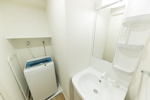 Separate tub and shower, deep soaking tub, hair dryer, slippers