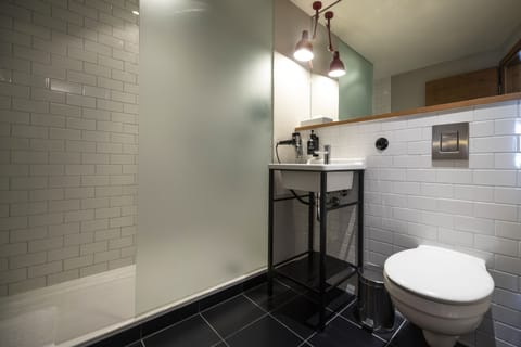 Shower, rainfall showerhead, designer toiletries, hair dryer