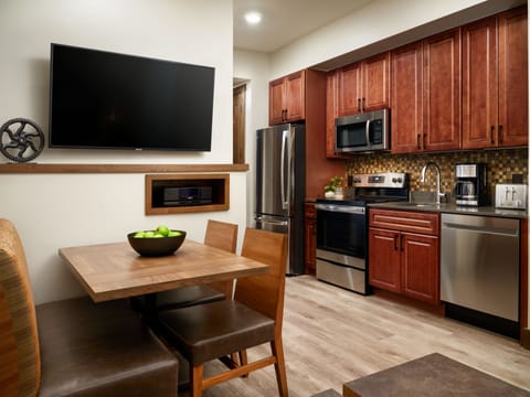 Suite, 1 Bedroom | Private kitchen | Full-size fridge, microwave, stovetop, dishwasher