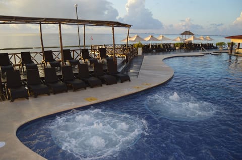 2 outdoor pools, open 6:00 AM to 8:00 PM, pool umbrellas, sun loungers