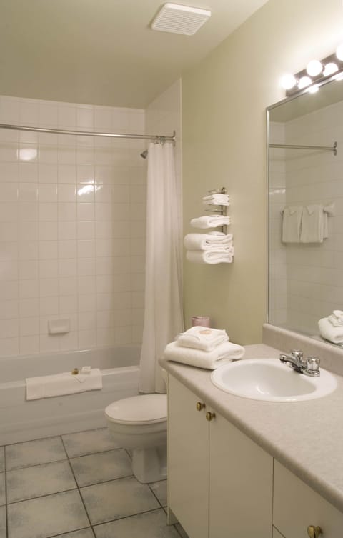 Classic Room, 2 Queen Beds | Bathroom | Combined shower/tub, eco-friendly toiletries, hair dryer, towels