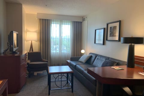 Suite, 1 Bedroom | Laptop workspace, blackout drapes, iron/ironing board, free WiFi